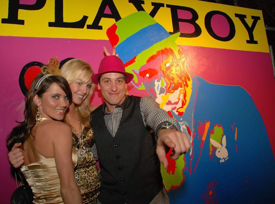 Playboy personalities with artist Ryan Paul Simmons at Karu & Y Ultralounge in Miami in 2009.