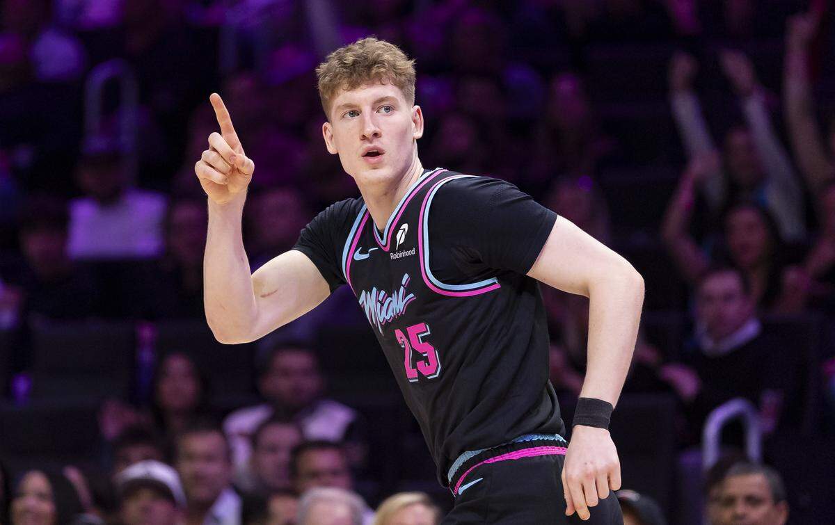 Miami Heat guard Kasparas Jakucionis (25) reacts after scoring against the Orlando Magic in the first half of their NBA game at Kaseya Center on March 14, 2026, in Miami.