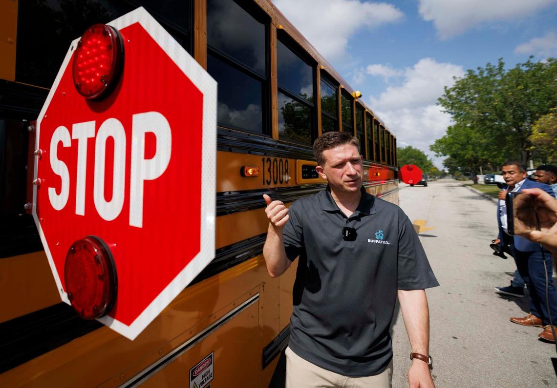 Steve Randazzo, chief growth officer for BusPatrol, points to the license plate reading cameras, that are able to record up to eight lanes of traffic, after a press conference announcing a new bus stop-arm camera enforcement program to fine drivers who don’t stop at school buses when the stop sign is out on.