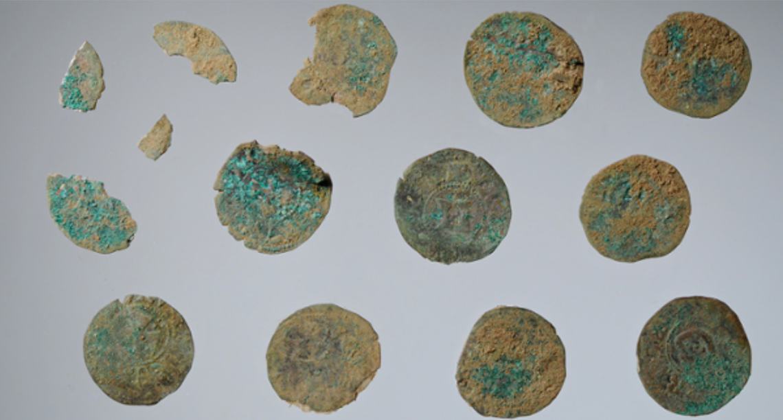 A few of the coins found buried.