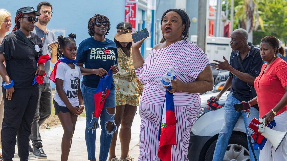 Patricia LeVasseur speaks during a gathering before the departure of a caravan led by Haitian organizers to show support for the Harris campaign that began at the Little Haiti Cultural Center in Miami and traveled to the North Miami Library, on Saturday, August 10, 2024.