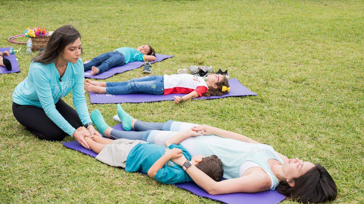 Kids Yoga Flow founders Gabriella Garcia, shown, and Ashley Rojas teach classes to moms and kids, one of the many events and workshops offered throughout May in the “Mother’s May Wellness Series.”