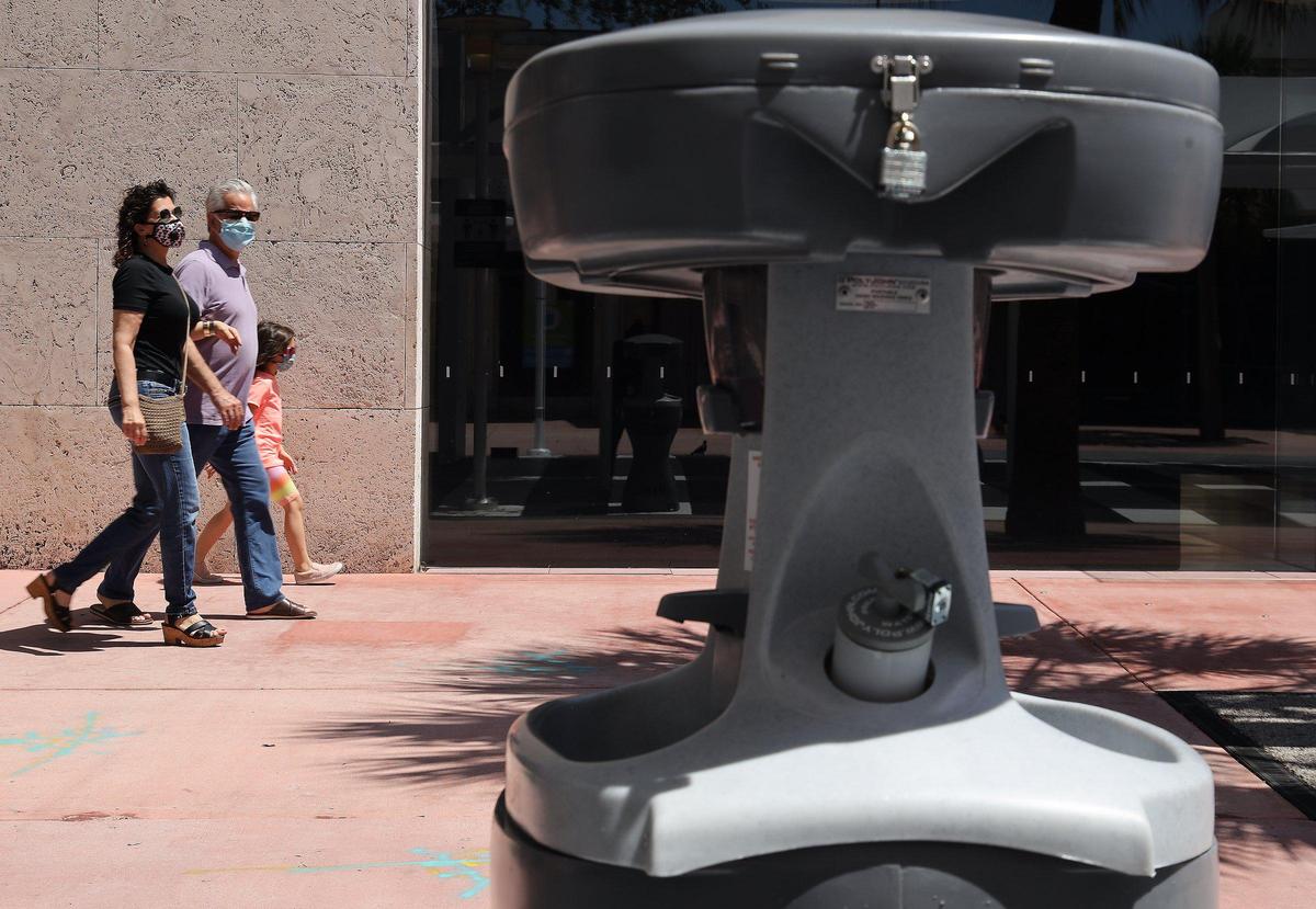 Hand washing stations have been installed to encourage healthy shopping while some of Lincoln Road Mall businesses reopened as part of Phase 1 as shoppers and locals walk the outdoor mall.