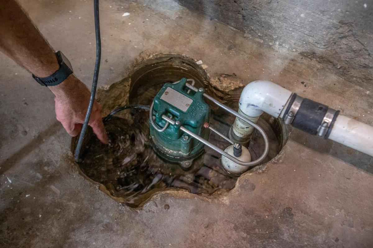A sump pump is installed under the floor to pump water out of the basement of the Miami-Dade County Courthouse, formerly known as the Dade County Courthouse. The historic courthouse is located at 73 West Flagler St. in Miami, on Thursday, July 29, 2021.