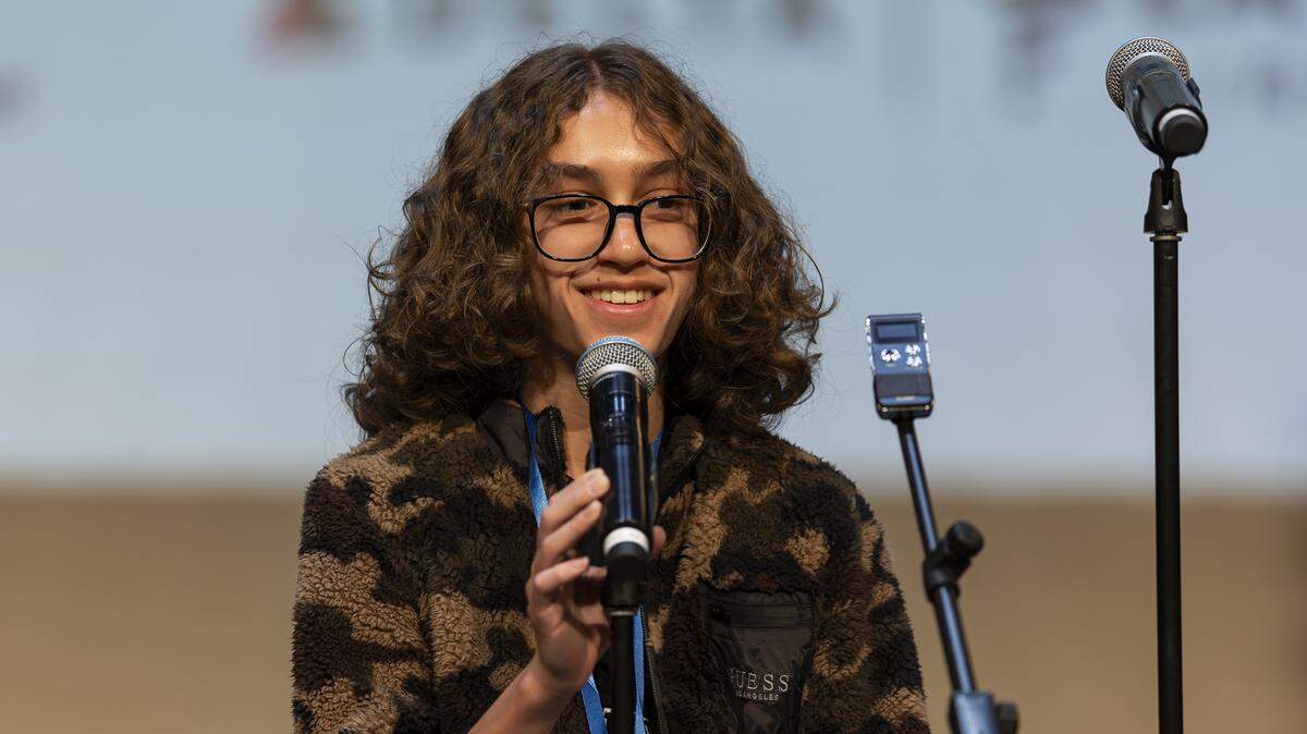 Lancaster Gramer, 14, an eighth grader from Franklin Academy Cooper City, reacts after correctly spelling the winning word, californium, to win the 86th Miami Herald Spelling Bee for Broward County at the Charles F. Dodge City Center on Wednesday, Feb. 25, 2026, in Pembroke Pines, Fla.
