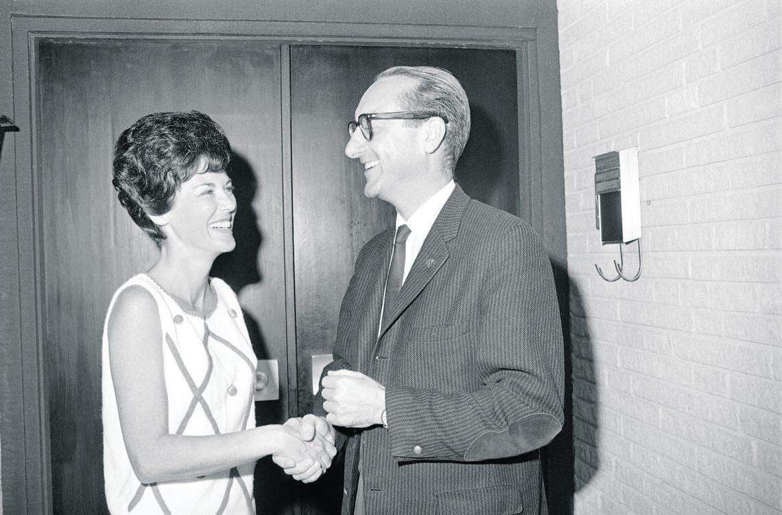 Pat Collins, wife of Apollo 11 command module pilot Michael Collins, greets Dr. George E. Mueller, associate administrator for NASA Manned Space Flight near the Manned Spacecraft Center, Houston, Tex., July 22, 1969 for a visit.