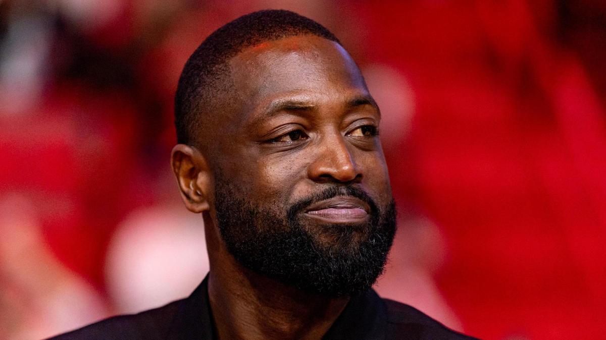 Former Miami Heat player Dwyane Wade reacts during a ceremony honoring his induction into the Naismith Basketball Hall of Fame at Kaseya Center in Miami, Florida, on Sunday, January 14, 2024.