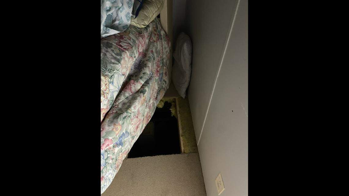 A fugitive accused of lewd behavior with a child was caught slithering under a West Florida home when deputies discovered a “makeshift hideout” beneath the floor, according to the Walton County Sheriff’s Office.