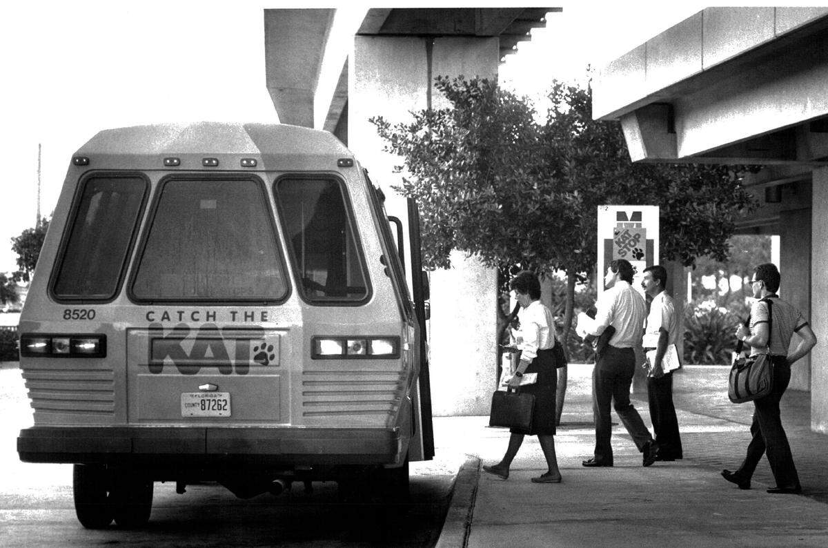 Passengers line up to catch the KAT, new mini-buses in 1987 that connected riders with Metrorail.