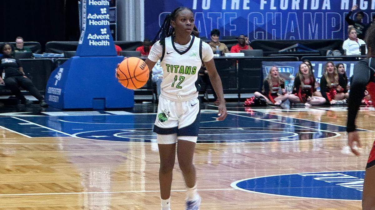 SLAM guard Jim’Miyah Branton runs a play during Thursday’s Class 4A girls basketball state semifinal against Jacksonville Bishop Kenny at the RP Funding Center in Lakeland, Fla.