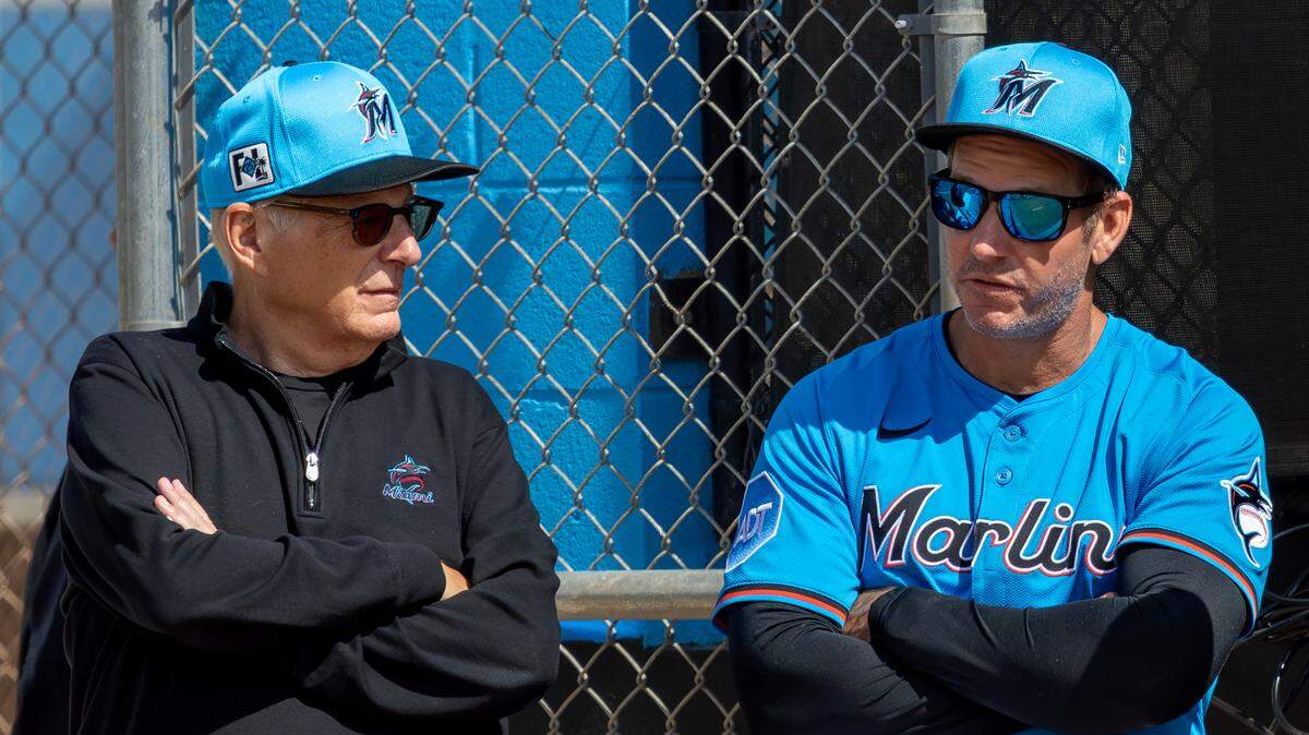 Miami Marlins owner Bruce Sherman and manager Clayton McCullough observe practice during the team’s first full-squad spring training workout at Roger Dean Stadium in Jupiter, FL, on Monday, Feb. 17, 2025.