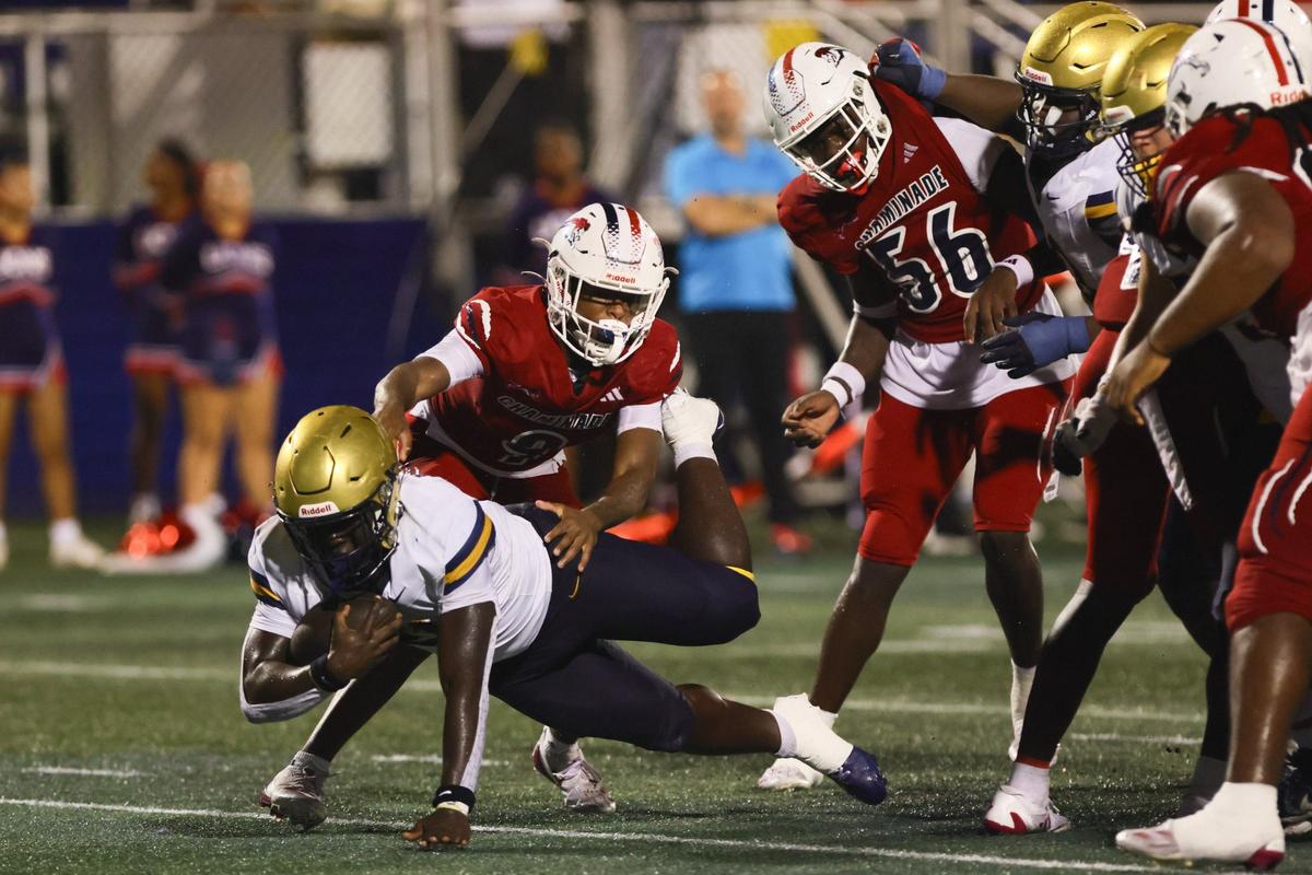 St. Thomas Aquinas Raiders running back Chance Washington (21) scores a touchdown against the Chaminade-Madonna Lions during the second quarterof a high school football game at Pitbull Stadium at Florida International University in Miami, Florida, Friday, October 11, 2024.
