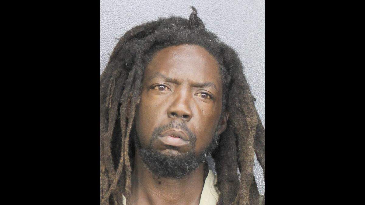 Jason Jarrod Butler, 39, is accused of fatally shooting Nathaniel Frasier George and shoving his body inside a trash can.