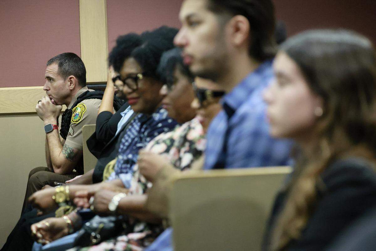 Supporters for Jose Mateo listen in court as lawyers argue Florida’s Stand-Your-Ground statute before Judge Ernest A. Kollra on Friday, Aug. 22, 2025. Mateo is one of four Miami-Dade officers charged with manslaughter in the case stemming from the death of UPS driver Frank Ordonez, who was shot by police during a shootout with his kidnappers. 