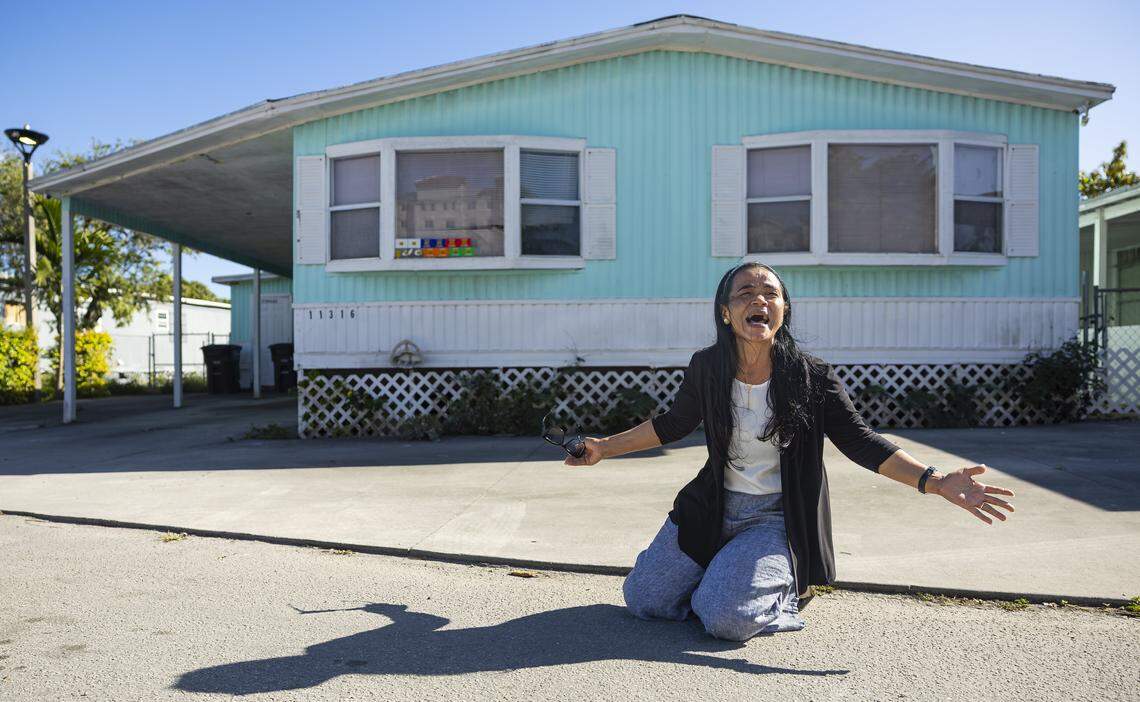 Marisol Sanchez, 55, cries in front of her former home at the Li'l Abner Mobile Home Park on Friday, March 7, 2025, in Sweetwater, Fla. She explained that her husband, Diego Valdes, who owned the mobile home and had declining health, felt pressured by developers to sell it for $14,000. She said that moments after he sold the home, he fell ill, and the next day, he passed away from a heart attack. Matias Ocner won a FSNE first place award for his Lil Abner Trailer Park work in spot news photography.