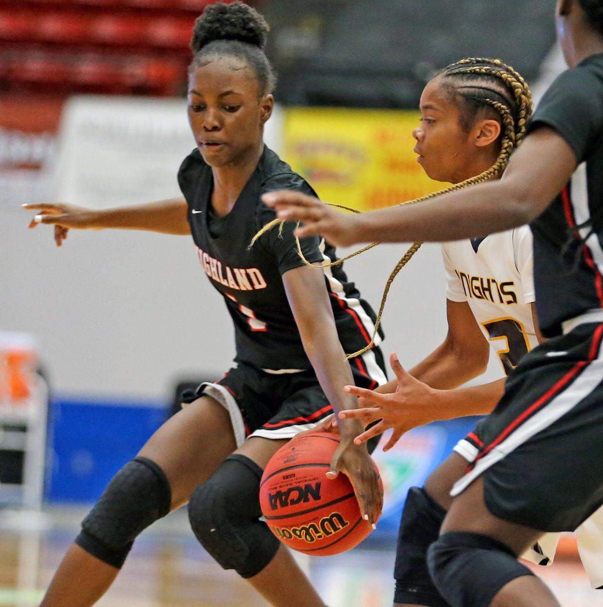Keys Gate HS Amari Hunter (2) gets the ball taken away by Lake Highland Prep Eleecia Carter (1) in the 5A Semi-Finals Girl’s State Basketball Championships at the RP Funding Center in Lakeland, Florida, Wednesday, February, 27, 2019.