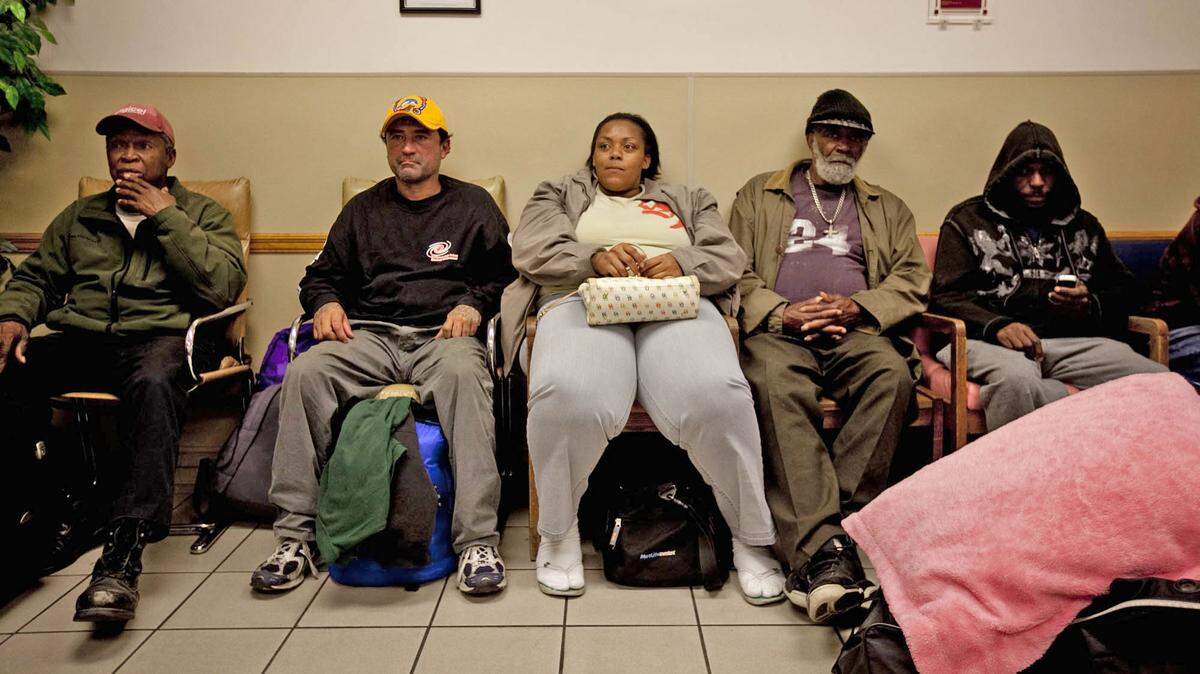 People wait for a place to stay at the Salvation Army of Broward County in this January 2018 file photo.  Due to the cold, the shelter turned no one away. Broward and Miami-Dade counties activated their cold weather shelter plan on Jan. 28, 2022 ahead of an arctic blast that is set to drop temperatures in South Florida to the 30s, with wind chills in the 20s.