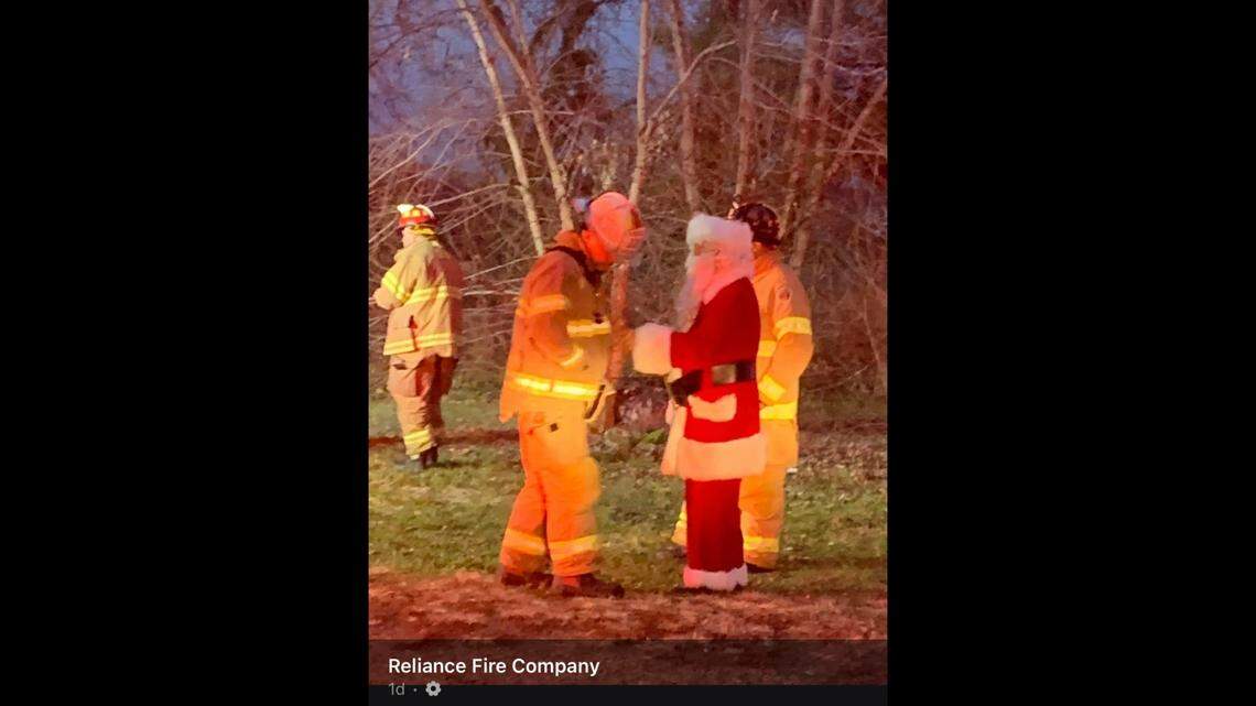 Santa Claus riding with a firetruck crew in Pilesgrove, New Jersey saw a house was burning and saved the family inside, according to the Reliance Fire Company.