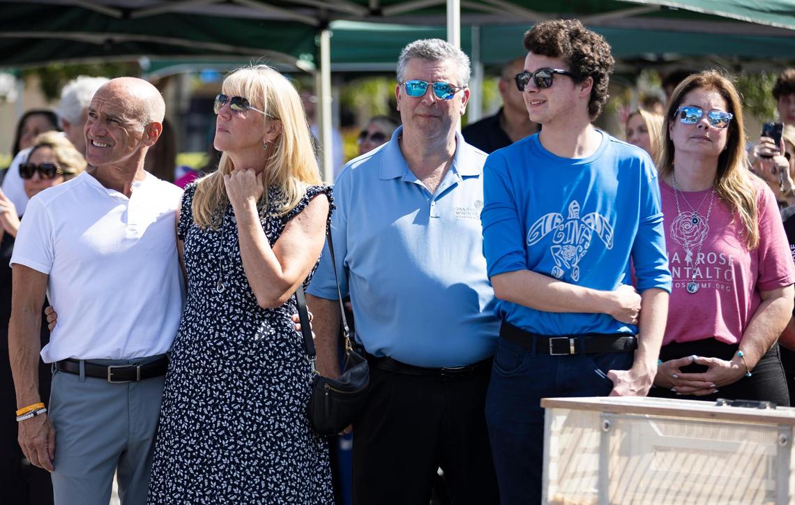 From left to right: Mitch Dworet, Annika Dworet, Anthony Montalto, Anthony Montalto III and Jennifer Montalto look on after doves were released during the ‘Forever in Our Hearts’ commemoration event outside Eagles’ Haven Wellness Center on Friday, Feb. 14, 2025, in Coral Springs, Fla. The event aims to honor the 17 lives lost during the Marjory Stoneman Douglas High School shooting in 2018 and their families.