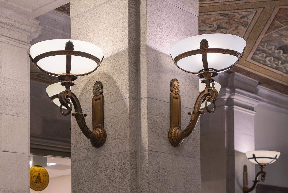 The historic Dade County Courthouse brass lighting fixtures are one of the many historic elements of the old courthouse in Miami, Florida, on Wednesday, January 14, 2026. The Dade County Courthouse is significant as an excellent example of Neo-Classical architecture. The detailing of the remaining historic interior spaces and features continue to reflect this distinctive style and contributes to a more complete understanding of the historic character of the Courthouse.