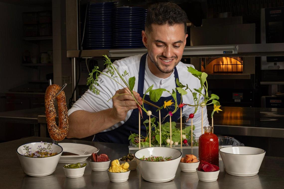 Chef Brandon Salomon prepares the grand mezze at Evelyn’s, a Mediterranean restaurant at the Four Seasons in Fort Lauderdale. Evelyn’s was named to the 2025 Michelin Guide.