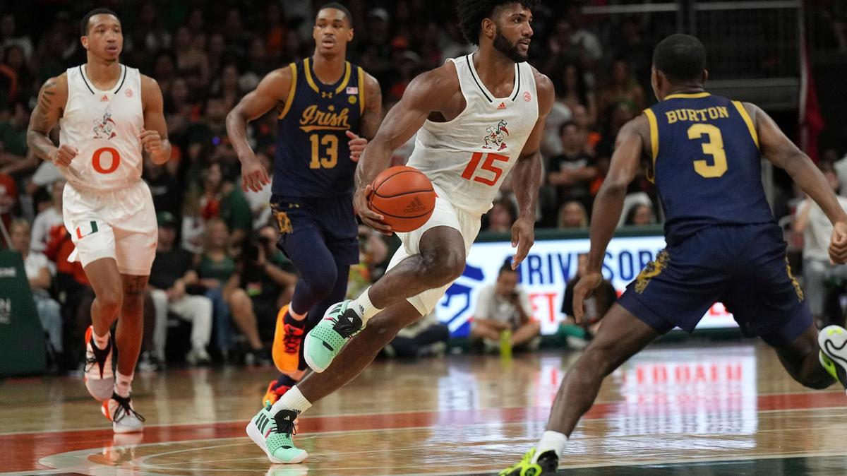 Miami forward Norchad Omier brings the ball up the court against Notre Dame during the first half.