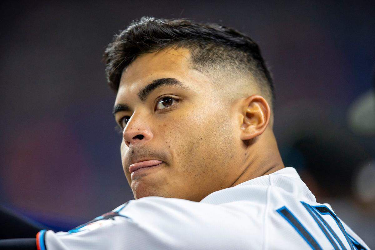 Miami Marlins pitcher Jesus Luzardo (44) reacts from the Marlins dugout during the sixth inning of an MLB game against the Seattle Mariners at loanDepot park in the Little Havana neighborhood of Miami, Florida, on Saturday, April 30, 2022. The Marlins defeated the Mariners 3-1.
