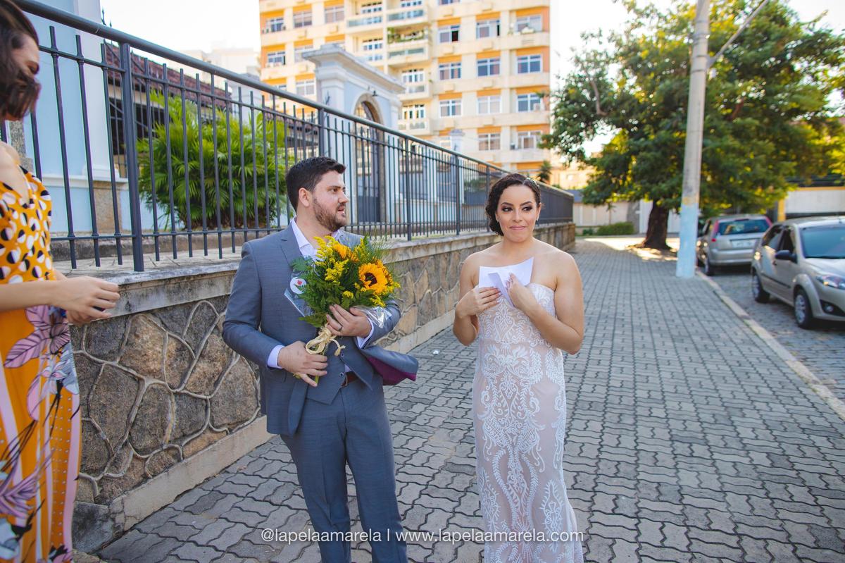 Helen Roldan and Luciano Carneiro of Miami Lakes were scheduled to get married this weekend in his hometown in Brazil but had to cancel at the last minute because of COVID-19. Before departing, they took photos in their wedding clothes with bouquets delivered by their florist.