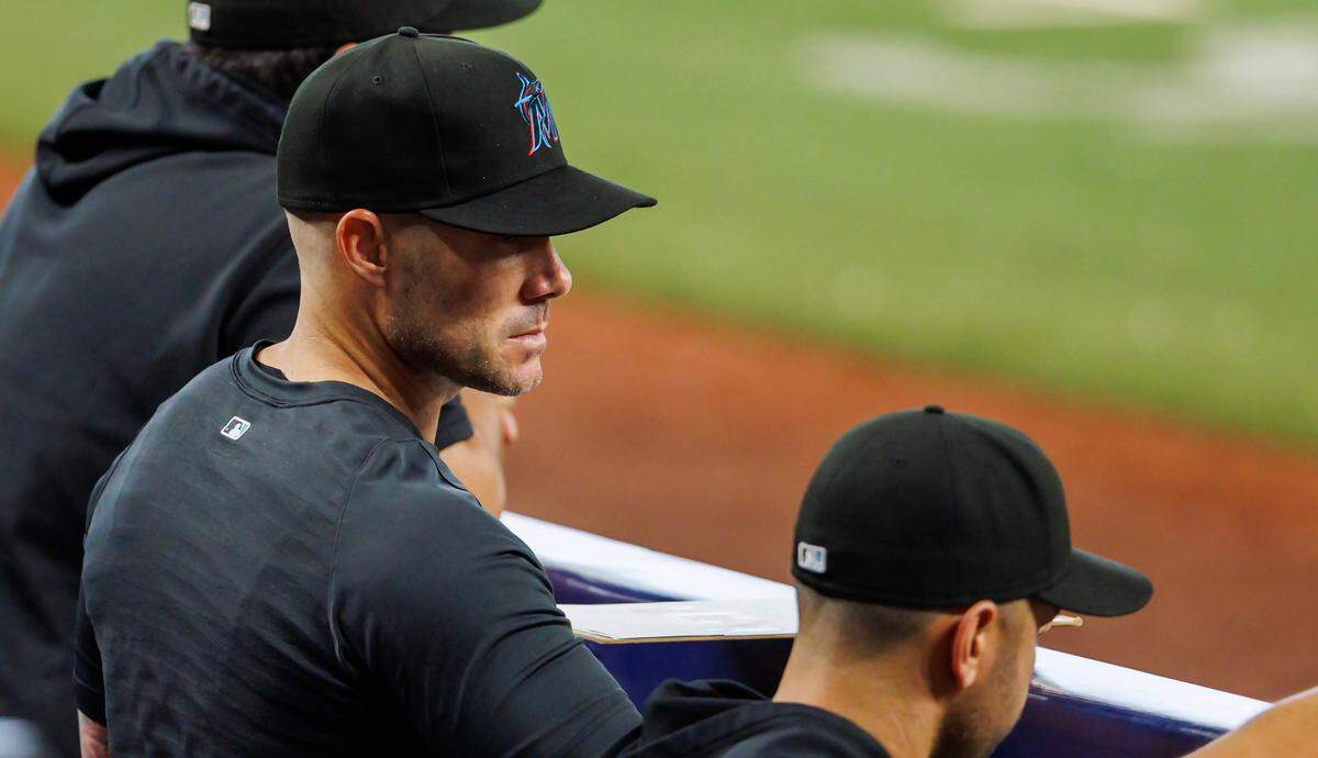 Miami Marlins manager Skip Schumaker looks from the dugout during the eighth inning of a baseball game against the Atlanta Braves at loanDepot park on Thursday, May 4, 2023 in Miami, Florida.