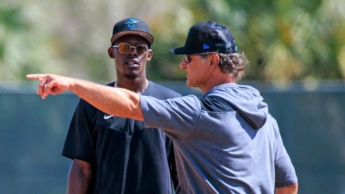 Miami Marlins manager Don Mattingly talks with Marlins second baseman Jazz Chisholm during their spring training workout at Roger Dean Stadium on Thursday, March 17, 2022 in Jupiter, FL.