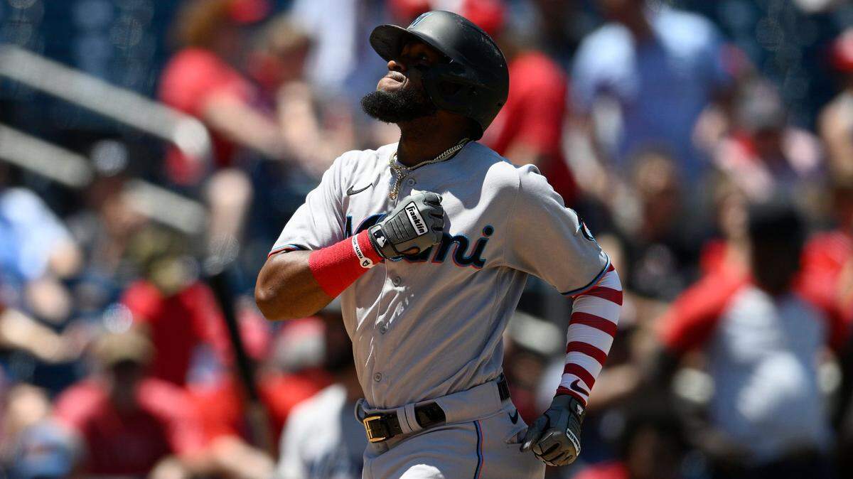Miami Marlins’ Bryan De La Cruz celebrates his two-run home run during the tenth inning of a baseball game against the Washington Nationals, Monday, July 4, 2022, in Washington. The Marlins won 3-2 in ten innings. (AP Photo/Nick Wass)