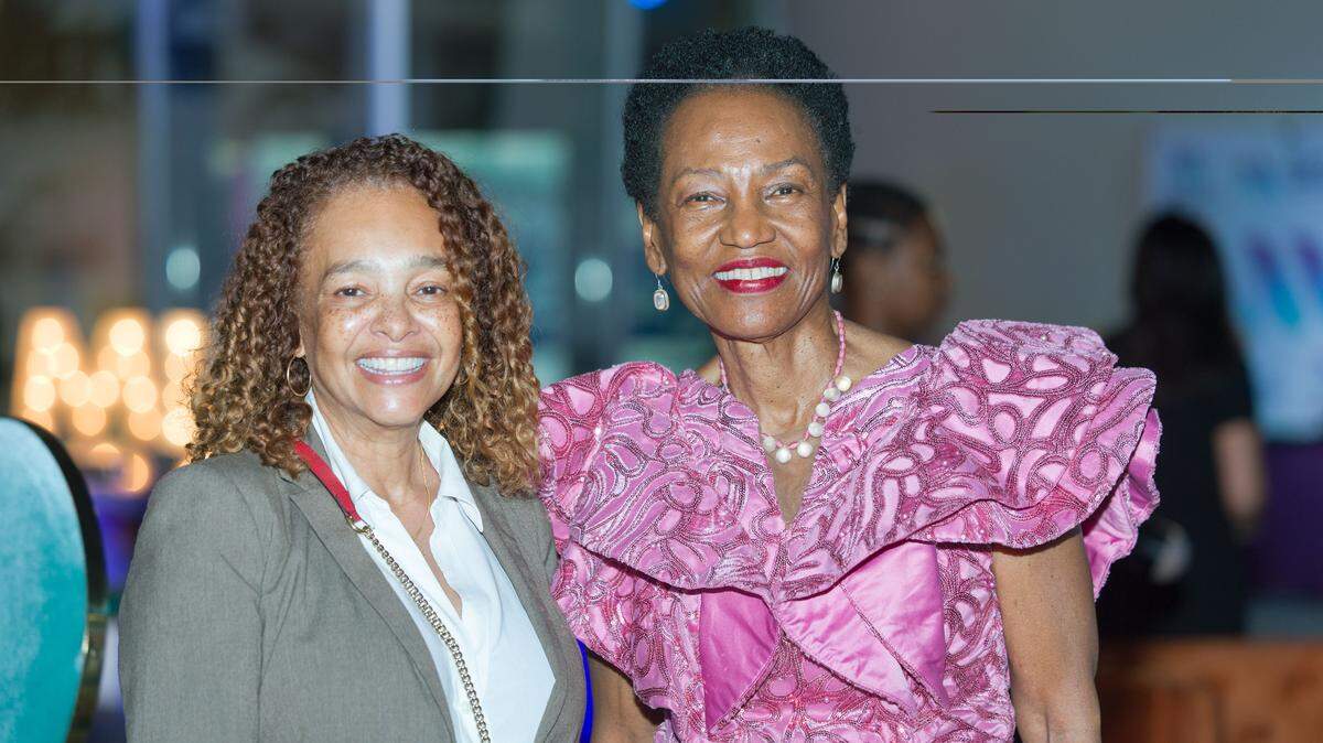 Miami City Commission Chairwoman Christine King, left, and Marilyn Holifield, co-founder of the Miami Museum of Contemporary Art of the African Diaspora, celebrate the 10th anniversary of the museum and plans for the museum to open in Overtown, Dec. 2, 2025, Historic Lyric Theater in Miami.