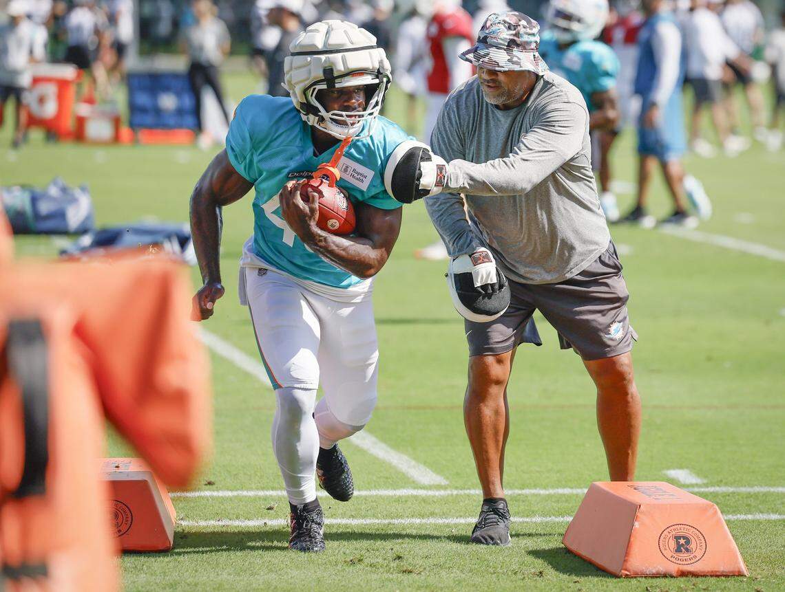 Miami Dolphins running back Aaron Shampklin (48) works through drills during an NFL football joint practice with the Jacksonville Jaguars at the Miami Dolphins Training Camp in Miami Gardens, Florida, on Thursday, August 21, 2025.