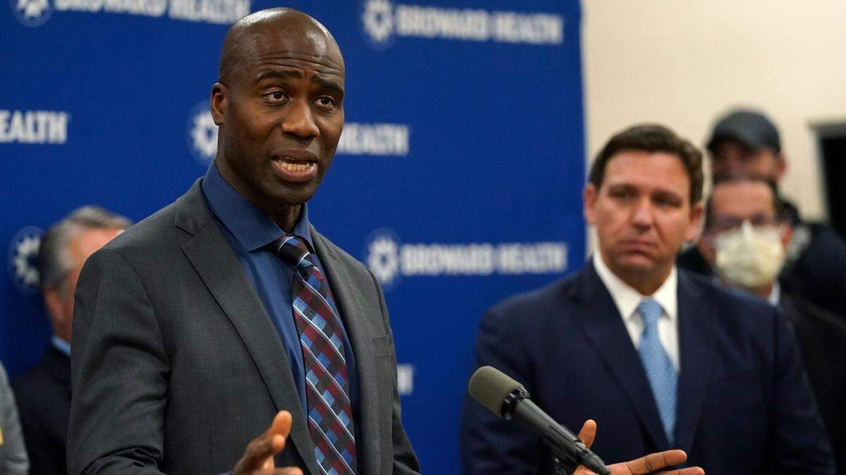 Florida Surgeon General Dr. Joseph A. Ladapo, left, at a news conference with Gov. Ron DeSantis in January at Broward Health Medical Center.