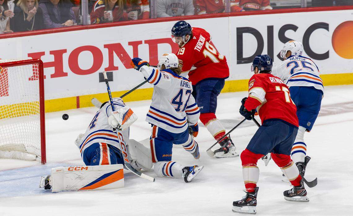 Florida Panthers left wing Matthew Tkachuk (19) fires a shot past Edmonton Oilers goaltender Stuart Skinner (74) to score during the first period of Game 4 in the NHL Stanley Cup Final at Amerant Bank Arena on Thursday, June 12, 2025, in Sunrise, Fla.