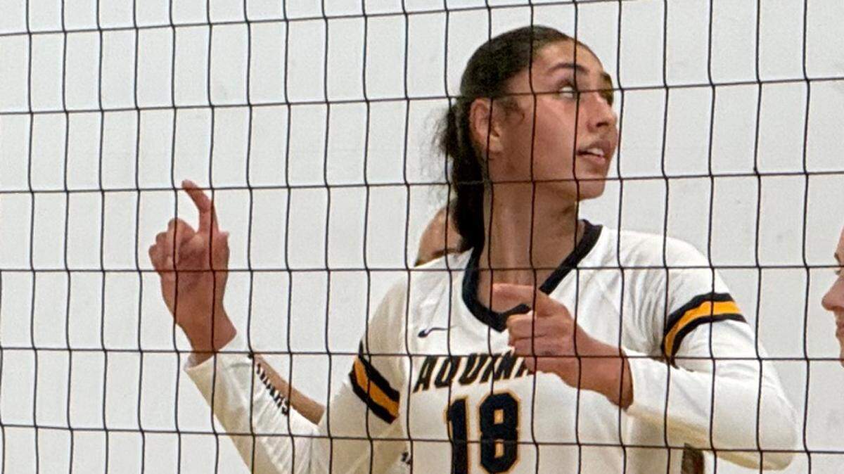 Isabella Sangha (No. 8) of the St. Thomas Aquinas’ girls’ volleyball team.