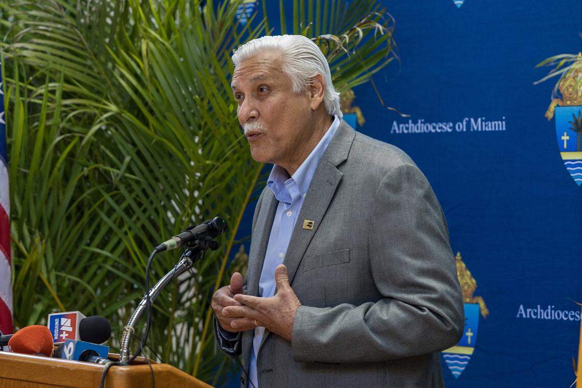 Dr. Javier Llorens, president of the Pedro Pan Board of Directors, speaks during a press conference held by the Archdiocese of Miami, to address the abrupt cancellation of an $11 million federal contract with Catholic Charities, in addition to the immediate and long-term impact on services for unaccompanied minors and the broader humanitarian mission of the Archdiocese. 