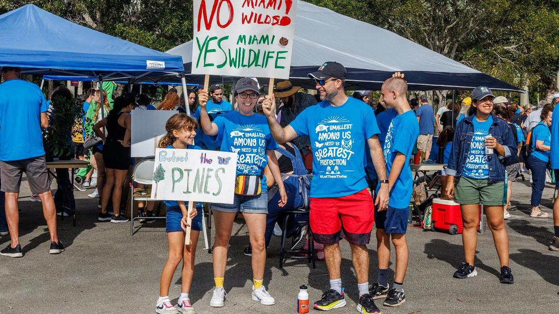 Evelyn Dean-Olmsted, husband Josh Olmsted and daughter Leila attended a rally led by Ron Magill, the communications director at Zoo Miami, to convince the Miami-Dade commission to vote against the controversial plan to build the Miami Wilds water park next to Zoo Miami, on Saturday, November 4, 2023.