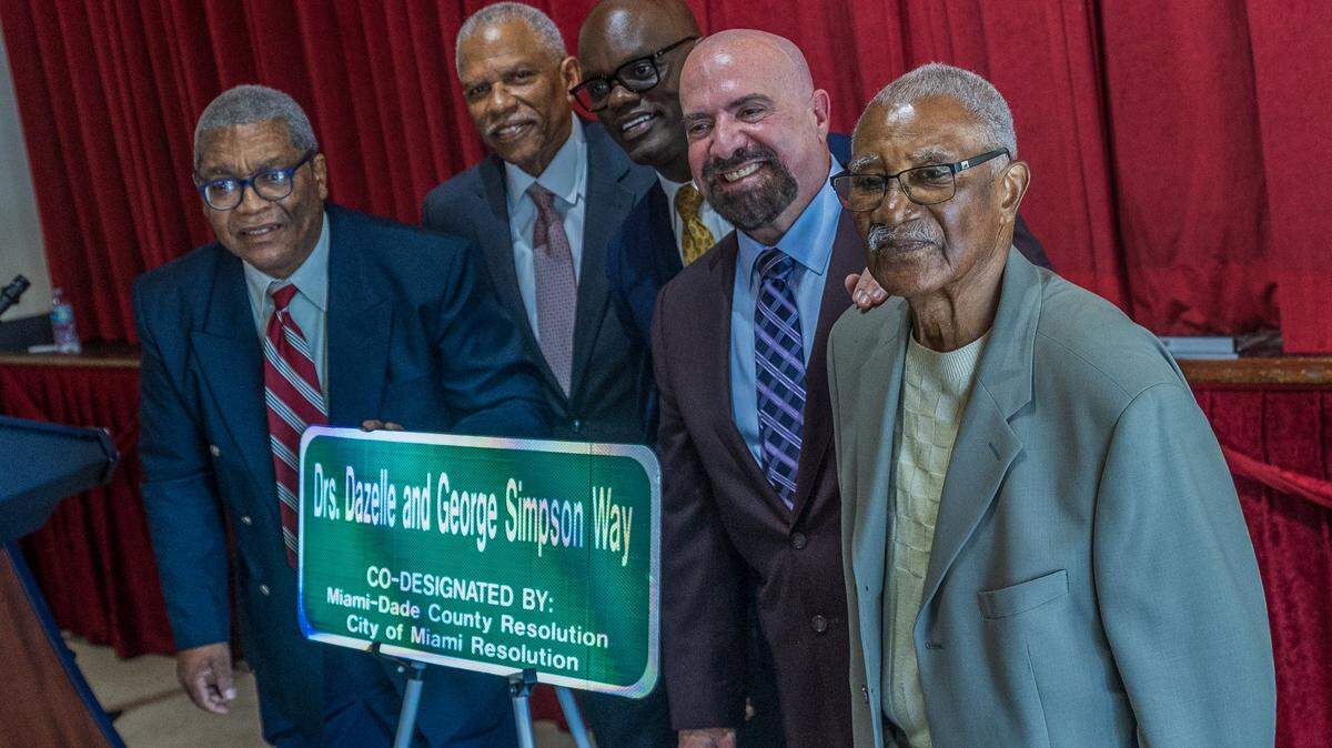 From left- George Simpson Jr., Dr Nelson L. Adams III, County Commissioner Vice Chairman Kionne L. McGhee, City of Miami Commissioner Damian Pardo and Ray Simpson (George's brother), posed during the street renaming ceremony to honor the Florida's first board certified Black pediatrician, Dazelle Simpson and her husband the state's first Black surgeon, George Simpson, celebrated at the Christ Episcopal Church, in Coconut Grove, on Friday, January 23, 2026.