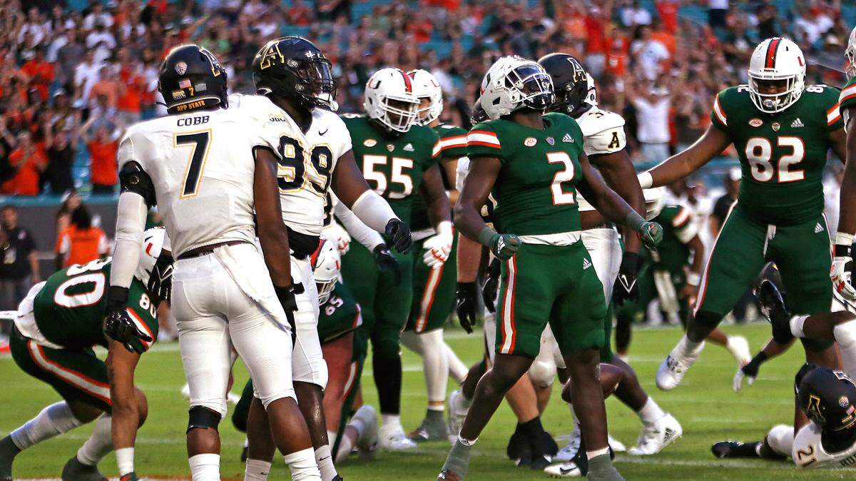 Miami Hurricanes running back Donald Chaney Jr. (2) celebrates after scoring a touchdown against the Appalachian State Mountaineers during the first quarter of their ACC football game at Hard Rock Stadium on Saturday, September 11, 2021 in Miami Gardens, Florida.