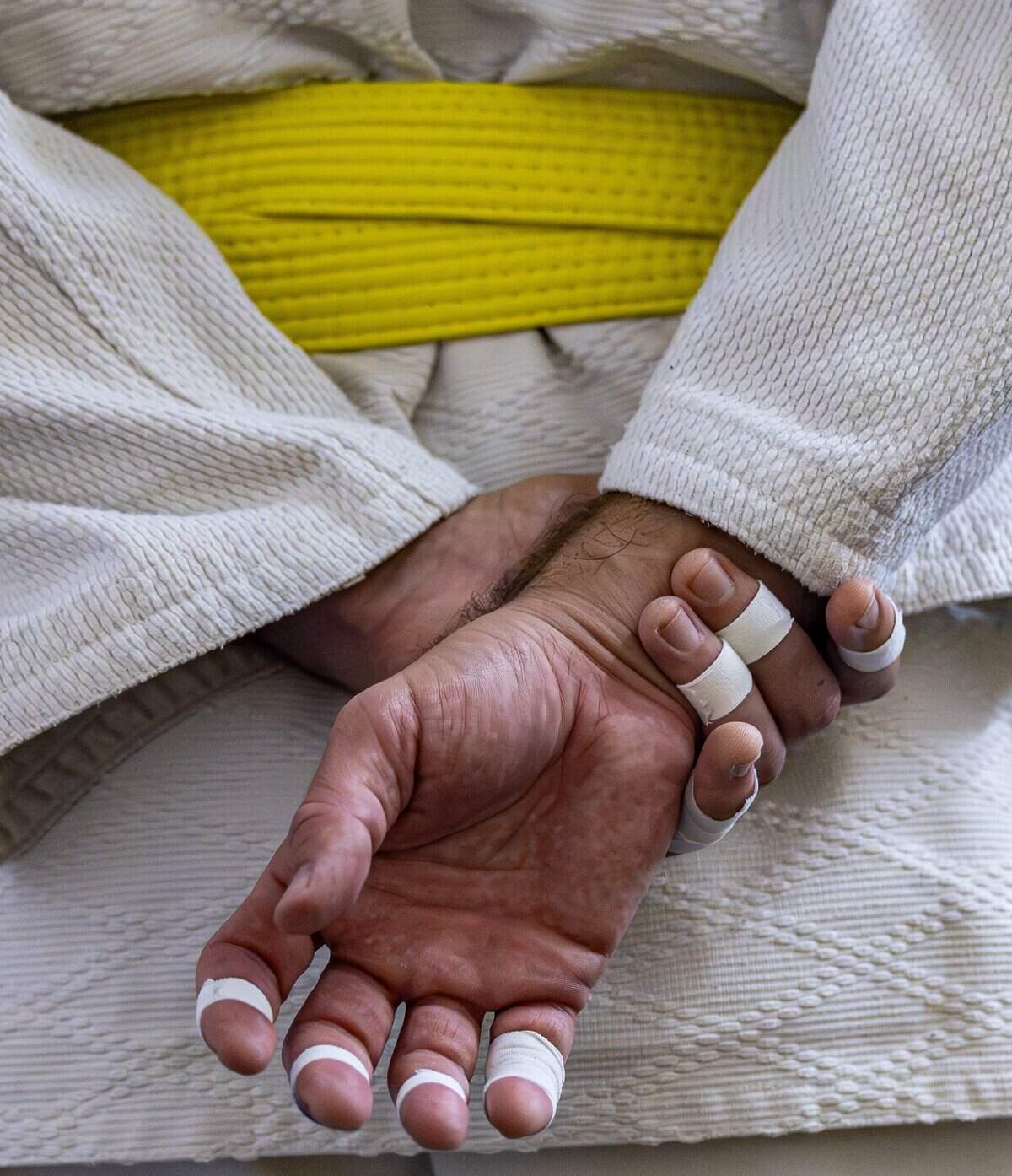 A close-up shows Jonathan Orriols' bandaged fingers during training at Baragua Judo Kai in Miami, Fla., on Wednesday, June 3, 2026.