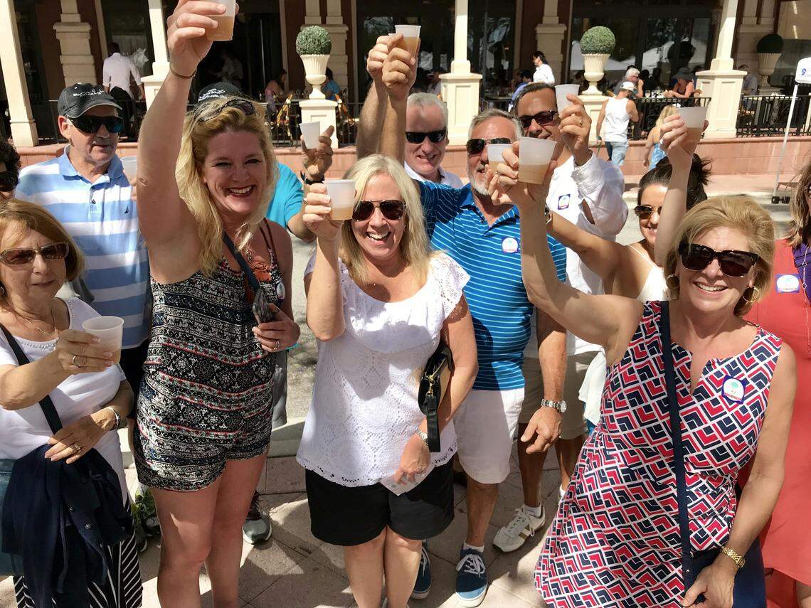 Guests raising a toast on a West Palm Beach Food Tour.