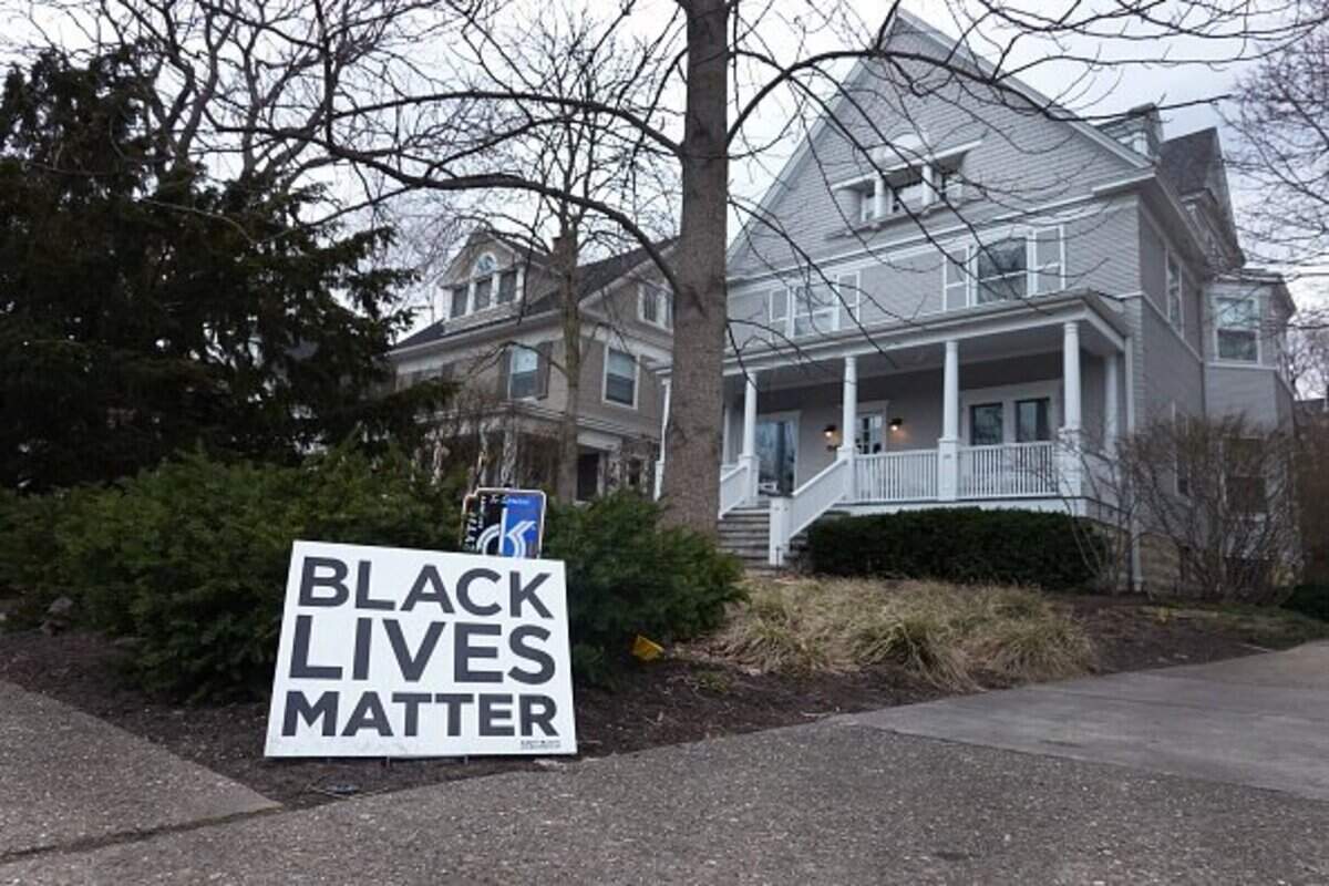 EVANSTON, ILLINOIS - MARCH 23: A Black Lives Matter sign sits in front of a home on March 23, 2021 in Evanston, Illinois. The City Council of Evanston voted yesterday to approve a plan, which may be the first of its kind in the nation, to make reparations available to Black residents due to past discrimination. To be eligible, residents must have either lived in or be a direct descendant of a Black person who lived in Evanston between 1919 to 1969 and who suffered housing discrimination because of city ordinances, policies or practices.  (Photo by Scott Olson/Getty Images)