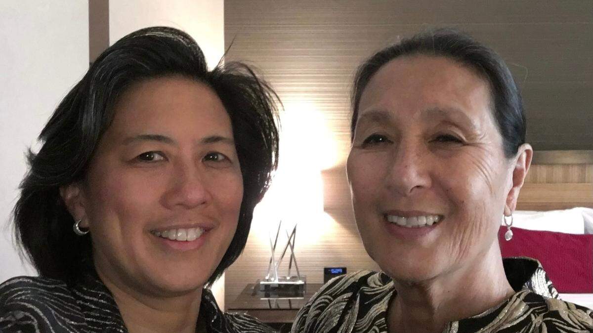 Miami Marlins general manager Kim Ng (left) and her mother, Virginia Cagar.
