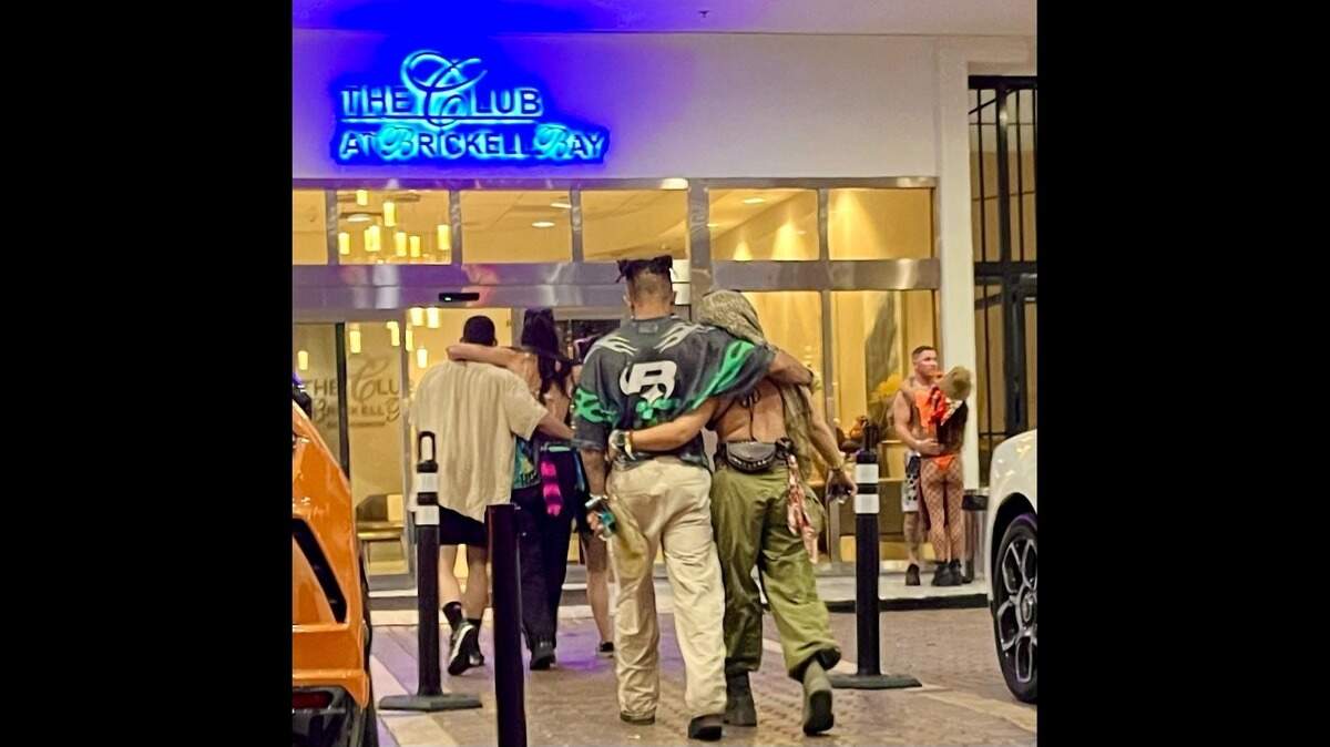Partygoers stumble back to The Club at Brickell Bay at 4 a.m. on March 30, 2026. 