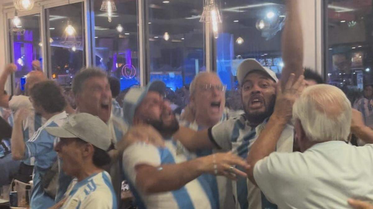Fans celebrate at Manolo, a bakery and restaurant in North Beach, after Argentina scored a goal on Sunday, July 14, 2024. Argentina won the Copa America final 1-0.