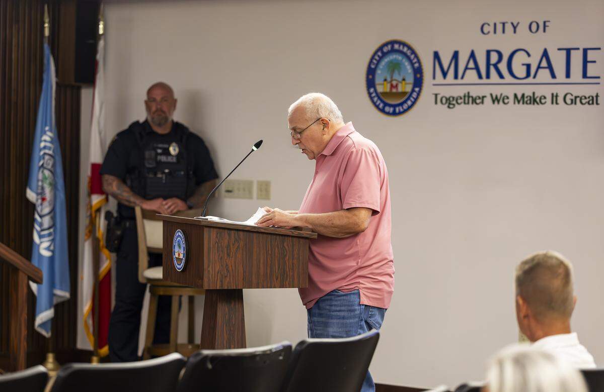 Margate resident Ron Roberts speaks during a commission meeting at Margate City Hall on Wednesday, June 3, 2026, in Margate, Fla. Protestors gathered at city hall in opposition to Larry Wallach's pending application to open a sloth encounter business in Margate.