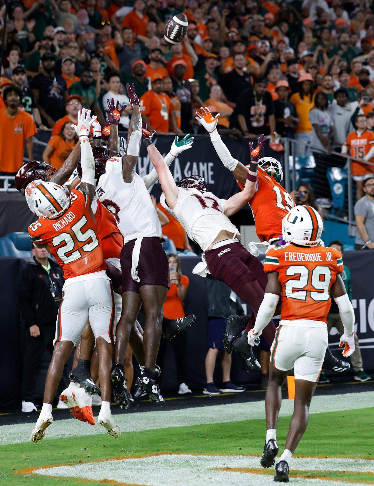 The game ended with a Virginia Tech Hail Mary pass attempt that was initially ruled a 30-yard game-winning, walk-off touchdown catch by Virginia Tech before the call was overturned after a lengthy review in an ACC football game at Hard Rock Stadium on Friday, September 27, 2024, in Miami Gardens, Fla.