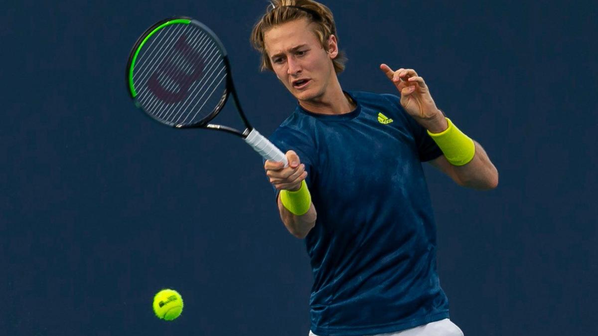 Sebastian Korda of the United States returns a shot to Diego Schwartzman of Argentina during their match at the Miami Open tennis tournament on Tuesday, March 30, 2021 at Hard Rock Stadium in Miami Gardens, Florida.