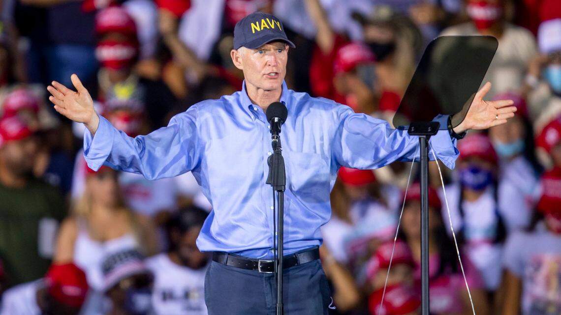 U.S. Sen. Rick Scott talks to a crowd at a Donald Trump rally in Opa-locka on Nov. 1, 2020.